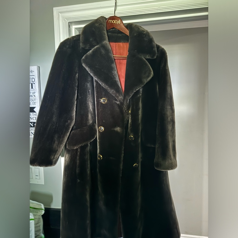 Woman’s knee length fur coat